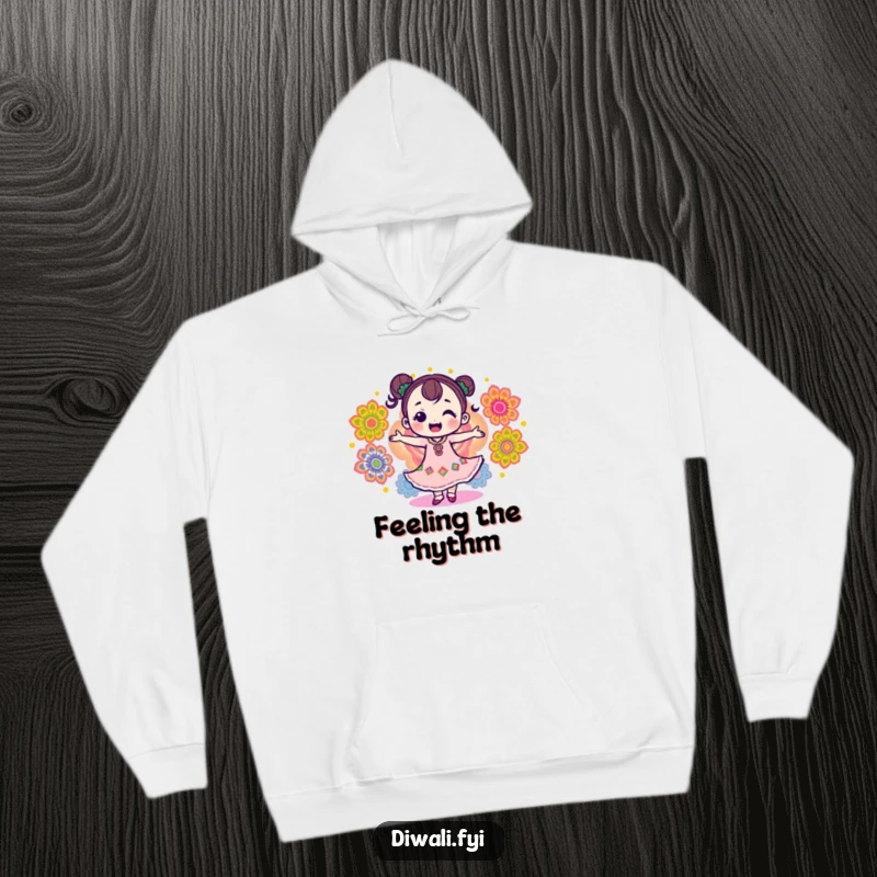 Funny hoodie depicting a delighted character dancing joyfully amongst intricate, colorful rangoli patterns, full of festive spirit.